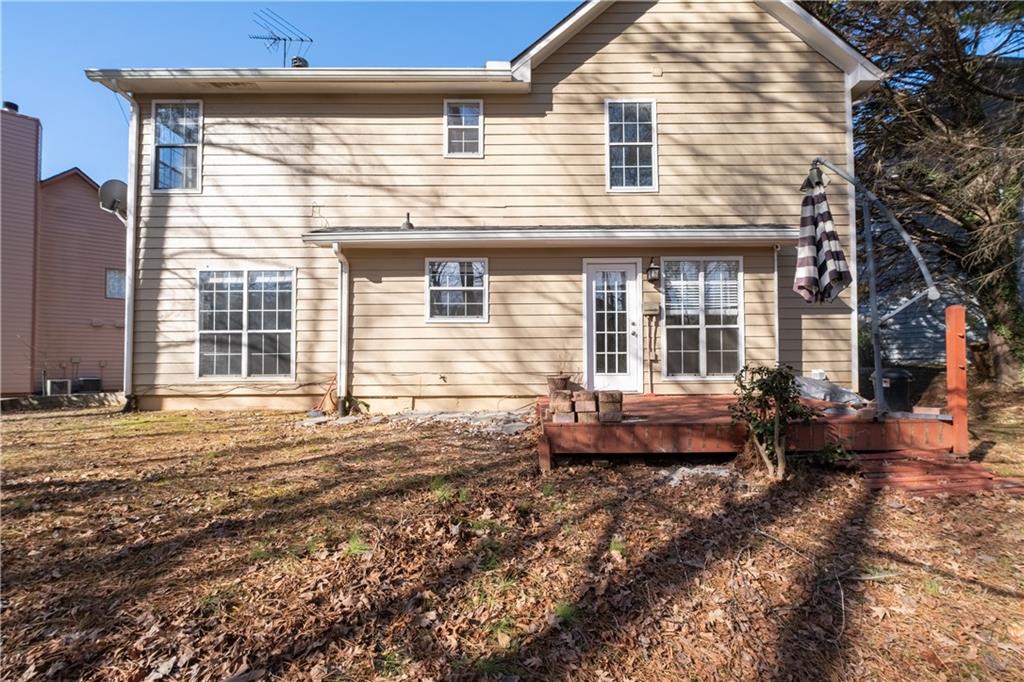 4240 Berkeley Mill Lane Duluth, GA 30096 - Photo 30 of 32 a front view of a house with a yard