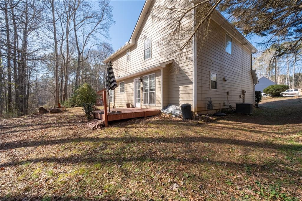 4240 Berkeley Mill Lane Duluth, GA 30096 - Photo 31 of 32 a view of a house with a yard