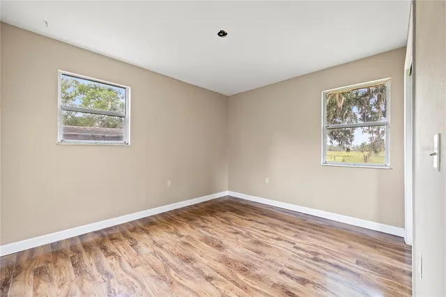 a view of a lake with a house