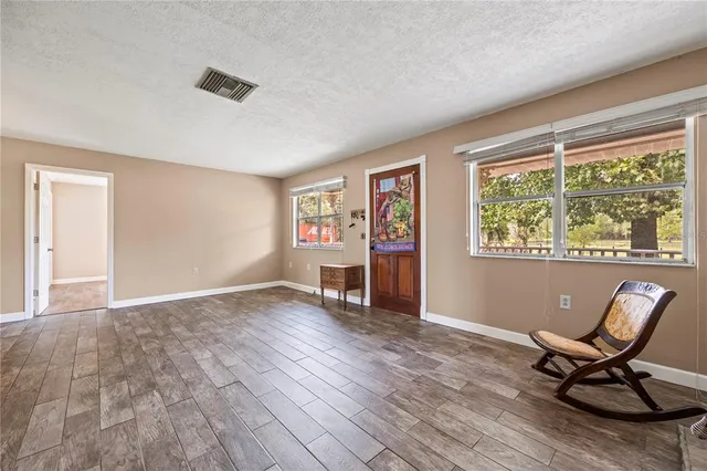 a view of a lake with a yard