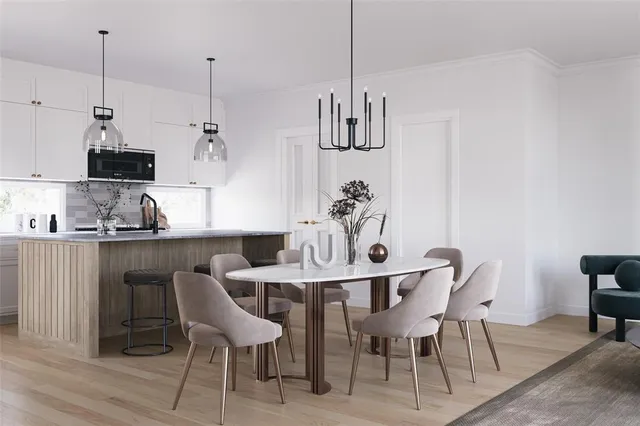 a view of kitchen and dining area with furniture