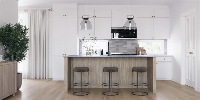 a kitchen with a table and chairs in it