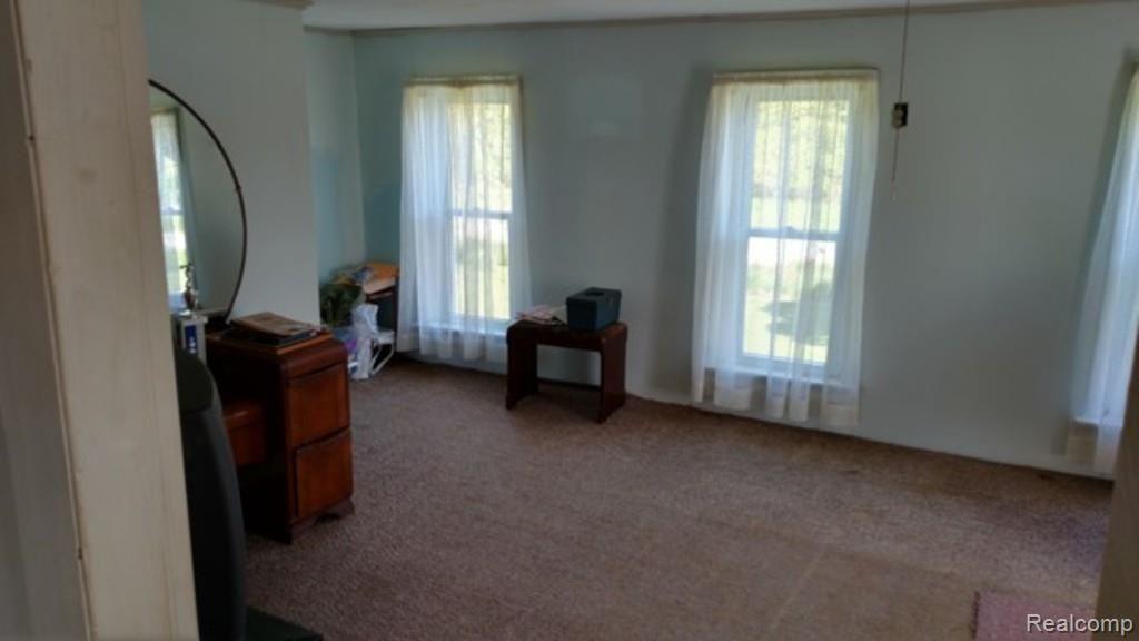 9183 Metcalf Road Avoca, MI 48006 - Photo 11 of 18 This is a view of another upstairs bedroom.