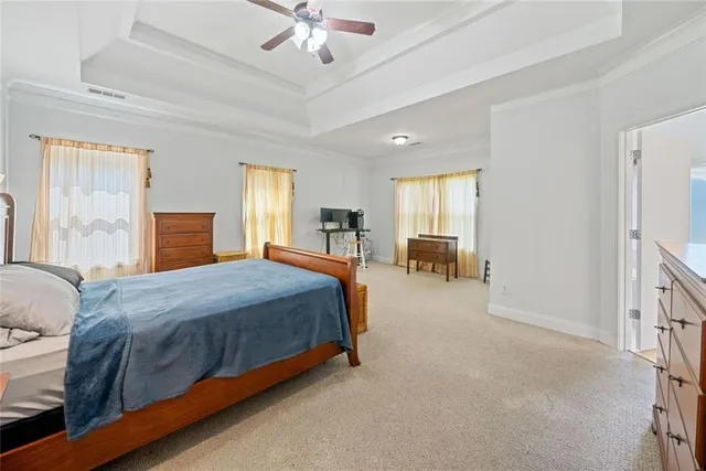 a bed room with a bed and furniture