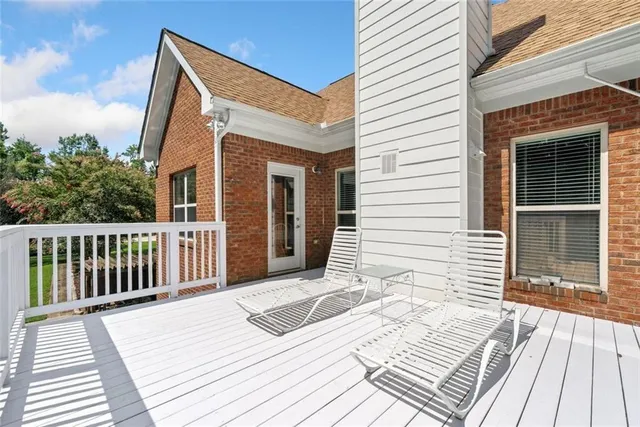 a view of a house with a roof deck