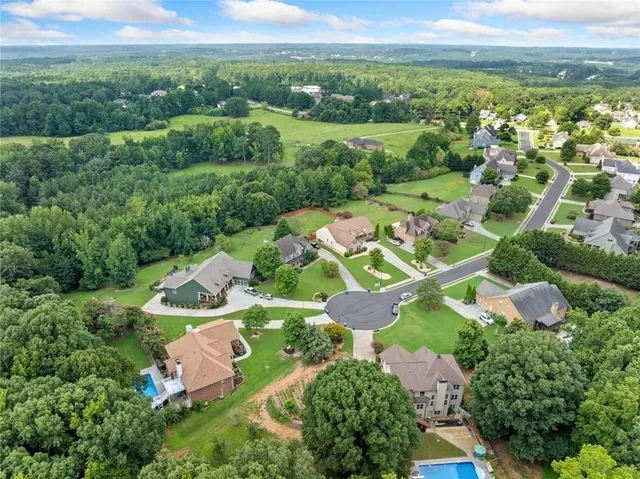 an aerial view of residential house with outdoor space