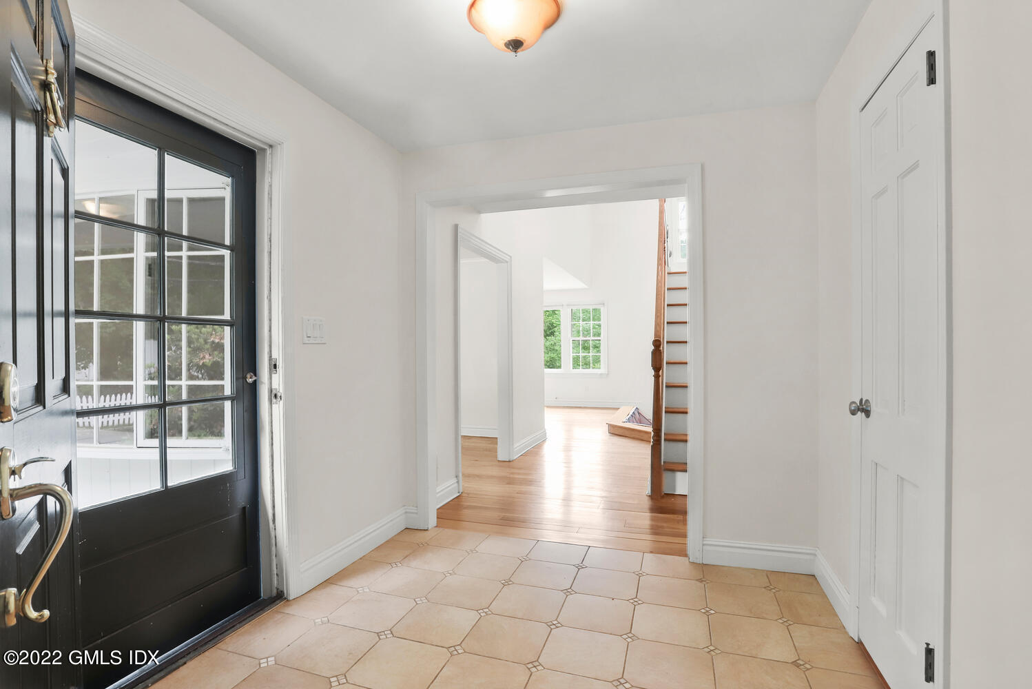 75 Fairfield Road Greenwich, CT 06830 - Photo 3 of 18 a view of empty room with wooden floor and fan