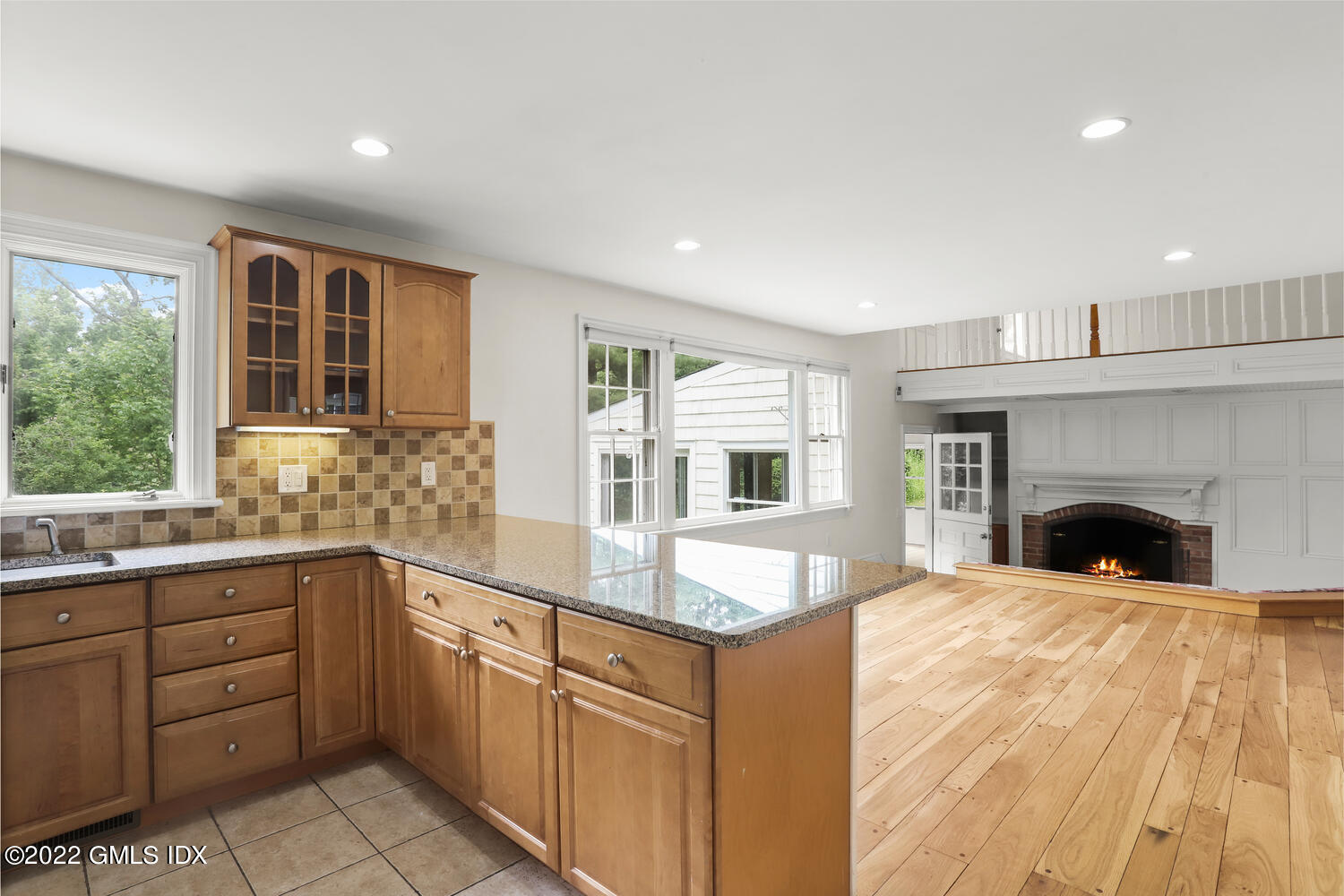 75 Fairfield Road Greenwich, CT 06830 - Photo 6 of 18 a kitchen with granite countertop a sink and cabinets