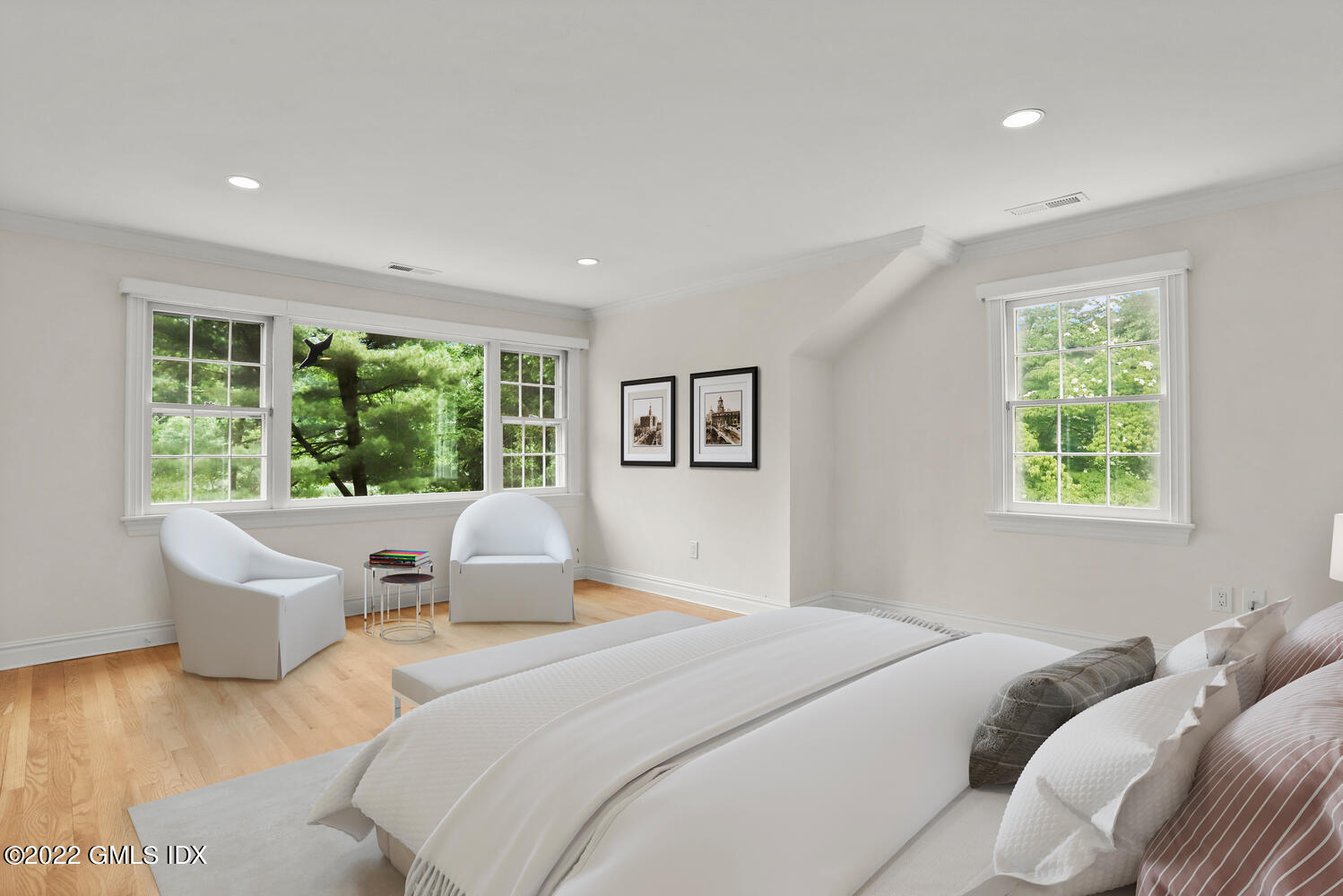 75 Fairfield Road Greenwich, CT 06830 - Photo 9 of 18 a bedroom with a large bed and a large window