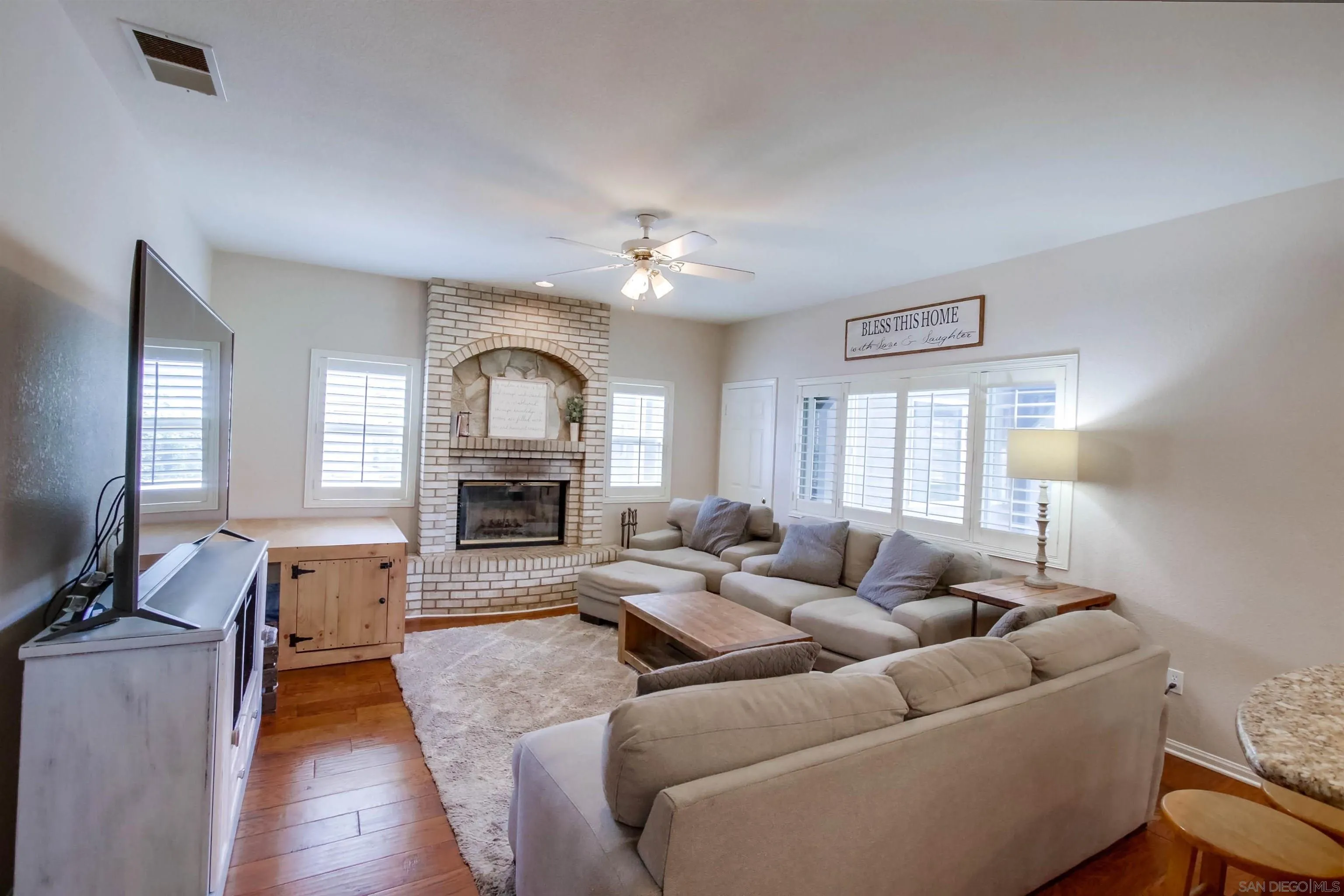 16304 Dartolo Road Ramona, CA 92065 - Photo 13 of 64 a living room with furniture fireplace and window