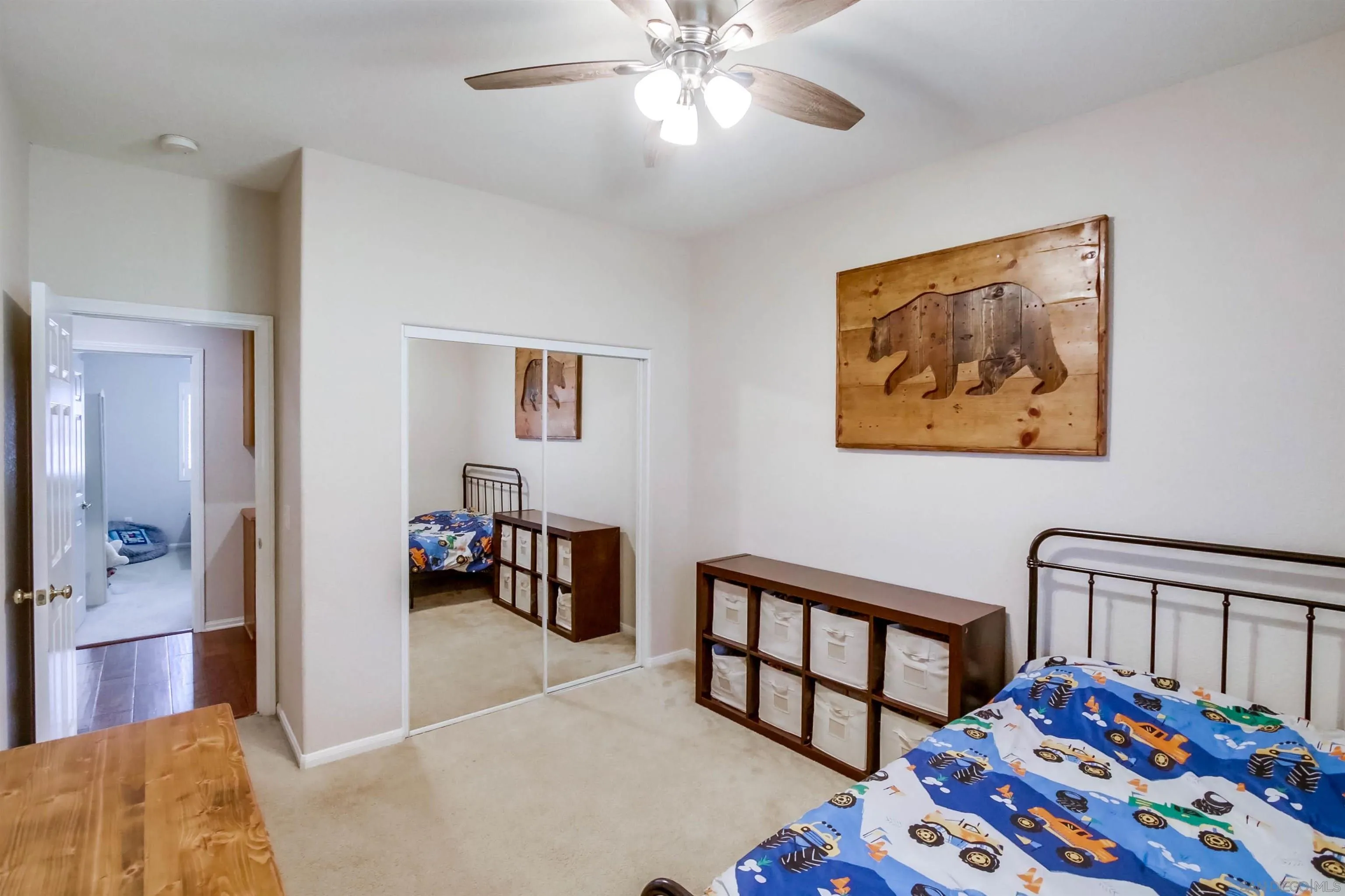 16304 Dartolo Road Ramona, CA 92065 - Photo 23 of 64 a bedroom with a bed and a chandelier