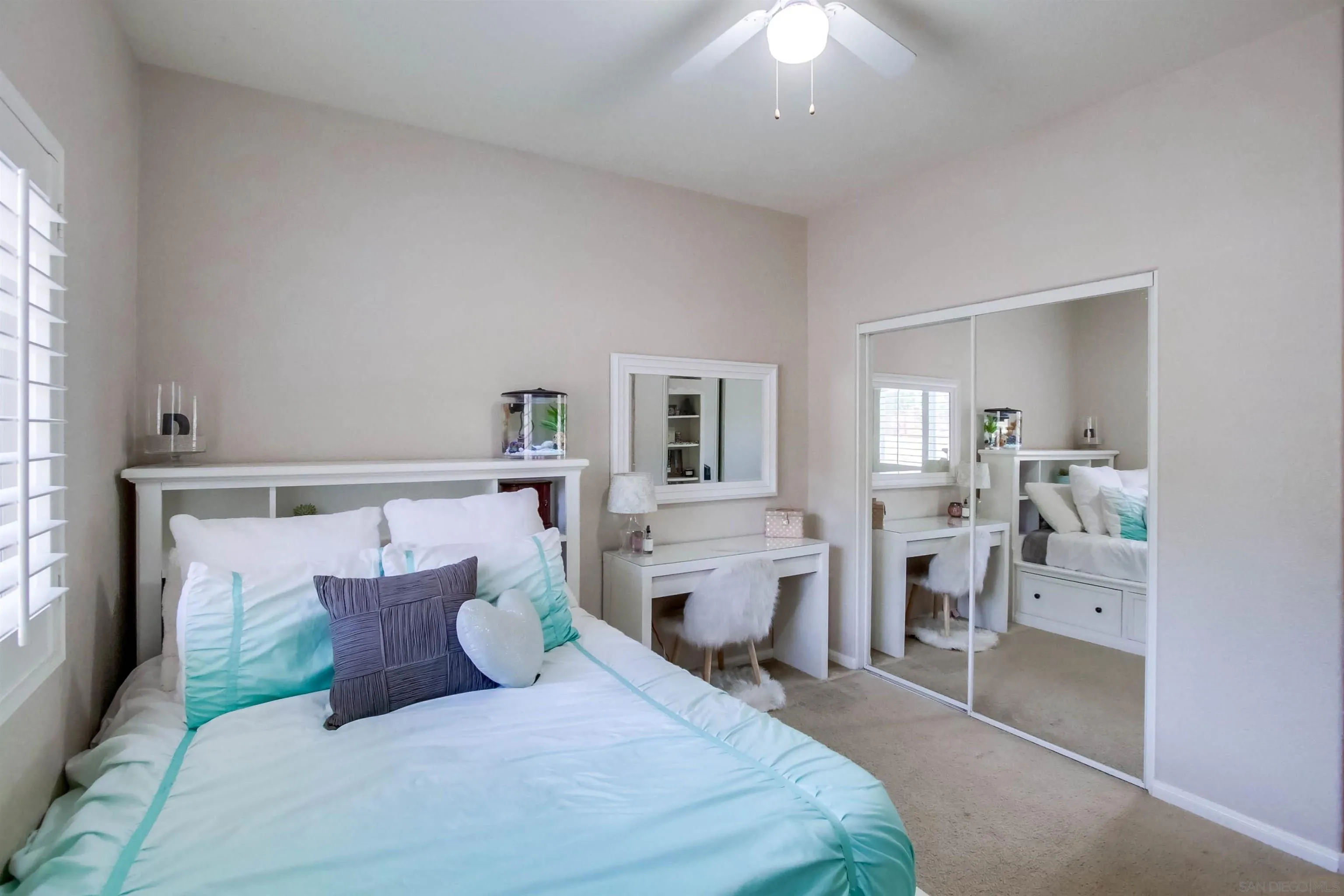 16304 Dartolo Road Ramona, CA 92065 - Photo 25 of 64 a bed room with a bed and a chair