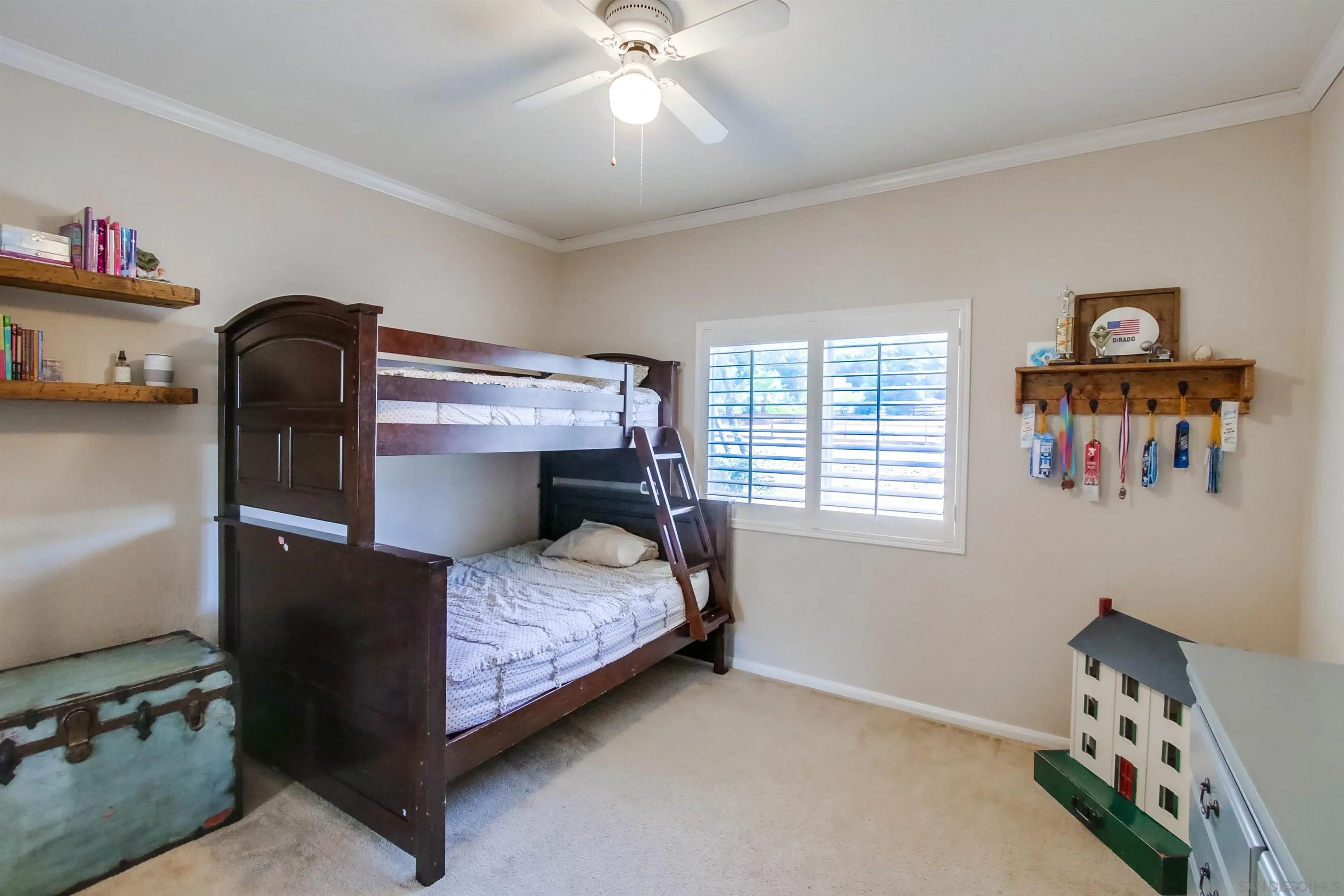 16304 Dartolo Road Ramona, CA 92065 - Photo 26 of 64 a bedroom with a bed and a window