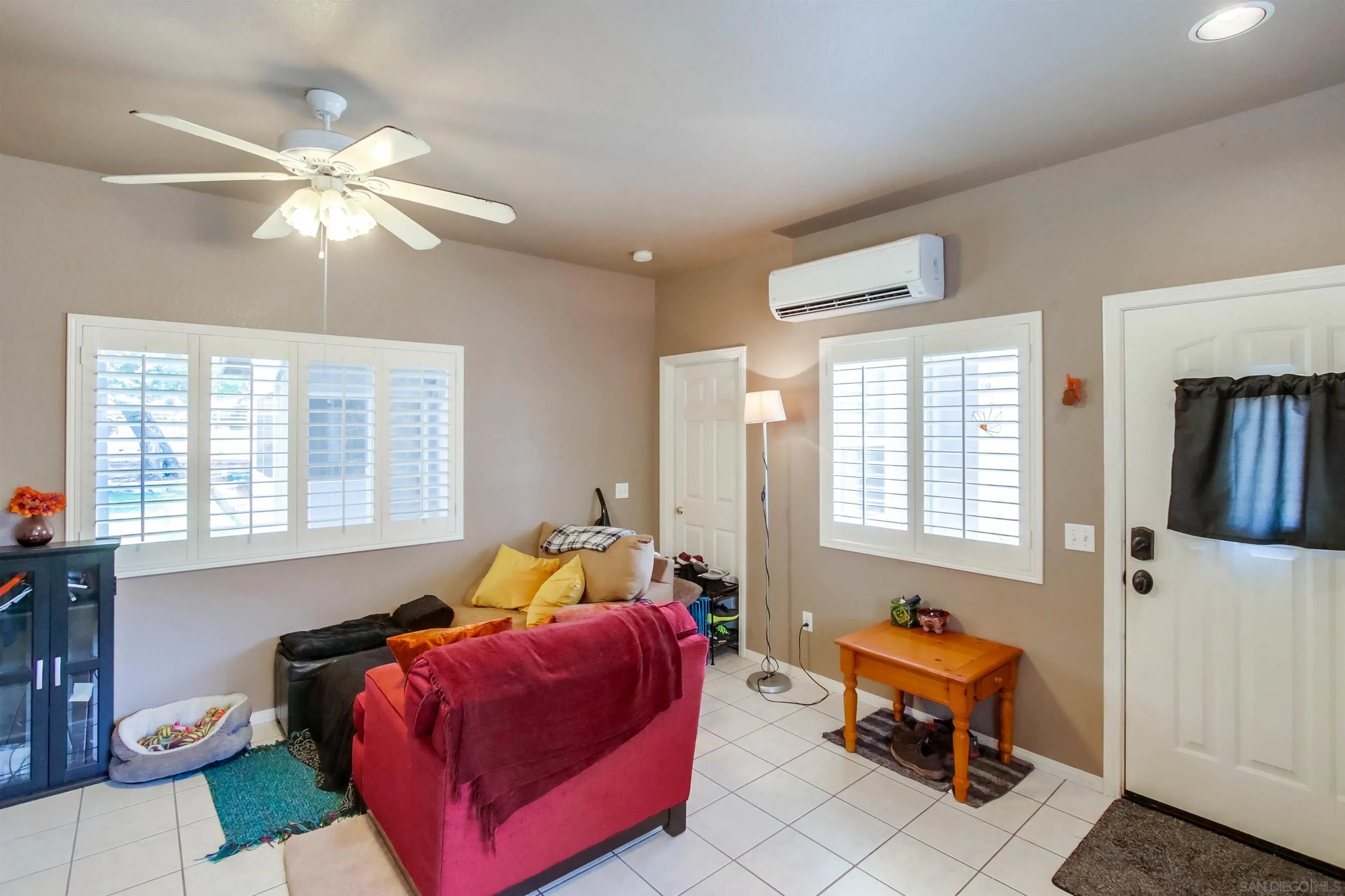 16304 Dartolo Road Ramona, CA 92065 - Photo 53 of 64 a bedroom with a bed and a window