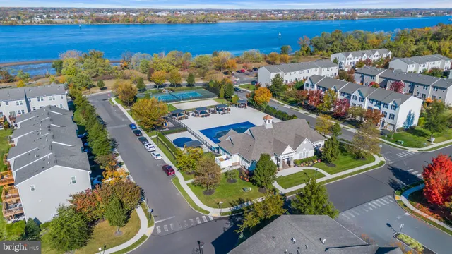 an aerial view of a house with outdoor space