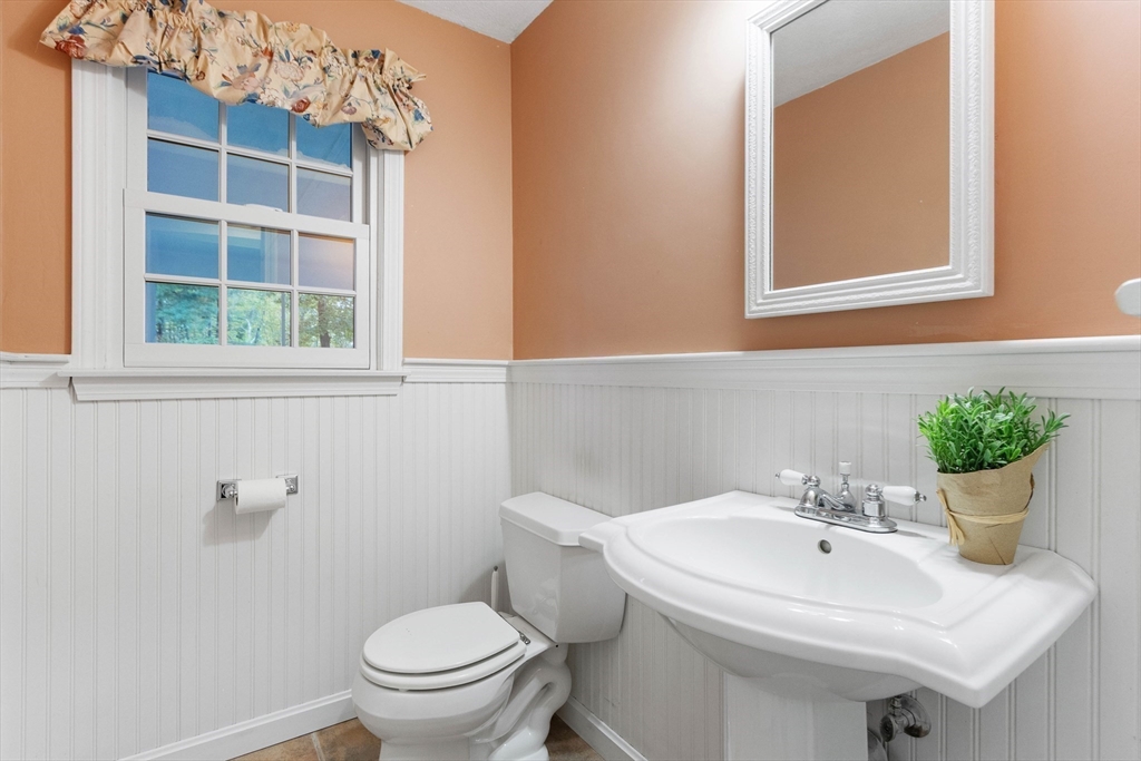7 Countryside Road Natick, MA 01760 - Photo 17 of 37 a bathroom with a sink and a toilet
