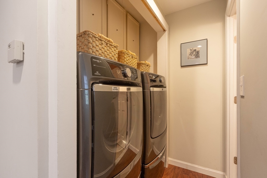 7 Countryside Road Natick, MA 01760 - Photo 18 of 37 a utility room with dryer and washer