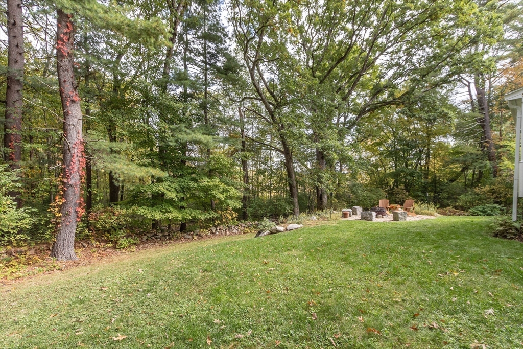 7 Countryside Road Natick, MA 01760 - Photo 34 of 37 a view of outdoor space with trees all around