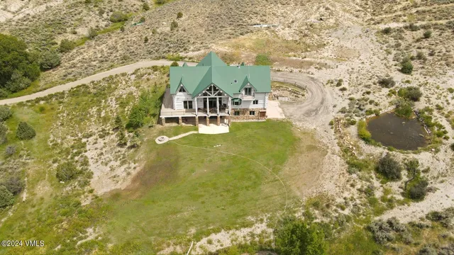a view of residential houses with outdoor space