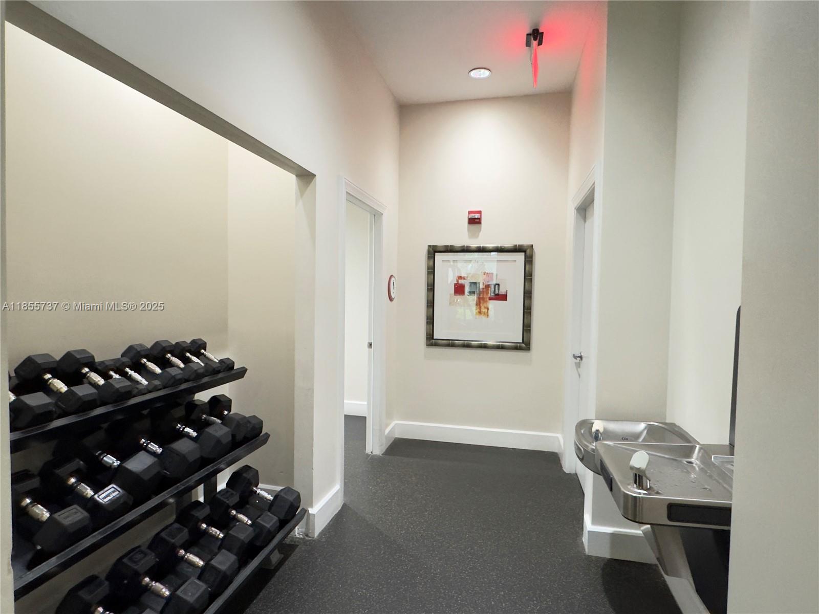 1830 Radius Drive, Unit 1301 Hollywood, FL 33020 - Photo 12 of 41 a room with storage and utility