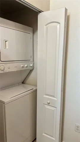 a balcony view with a seating space