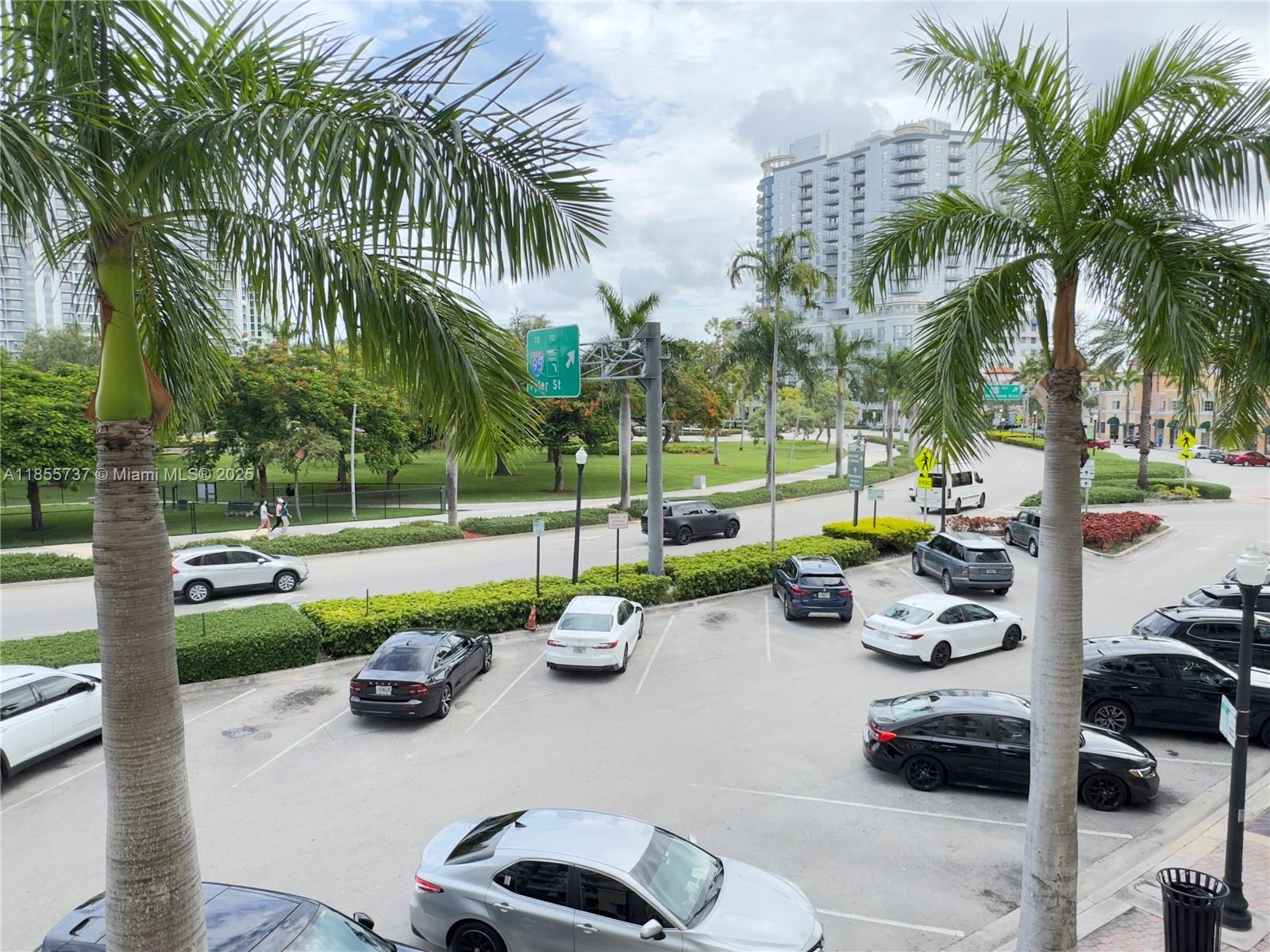 1830 Radius Drive, Unit 1301 Hollywood, FL 33020 - Photo 24 of 41 a view of a backyard with swimming pool and furniture
