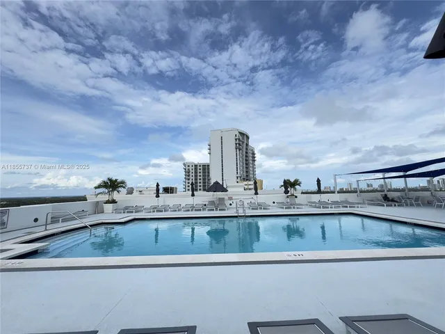 a view of a building with a street
