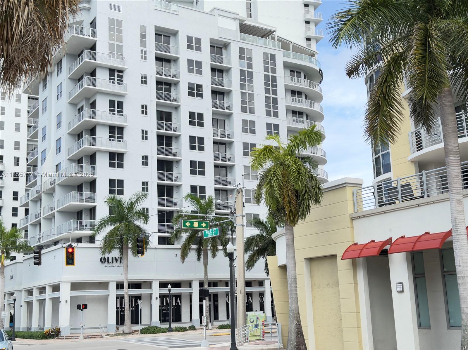 1830 Radius Drive, Unit 1301 Hollywood, FL 33020 - Photo 35 of 41 a front view of a multi story building