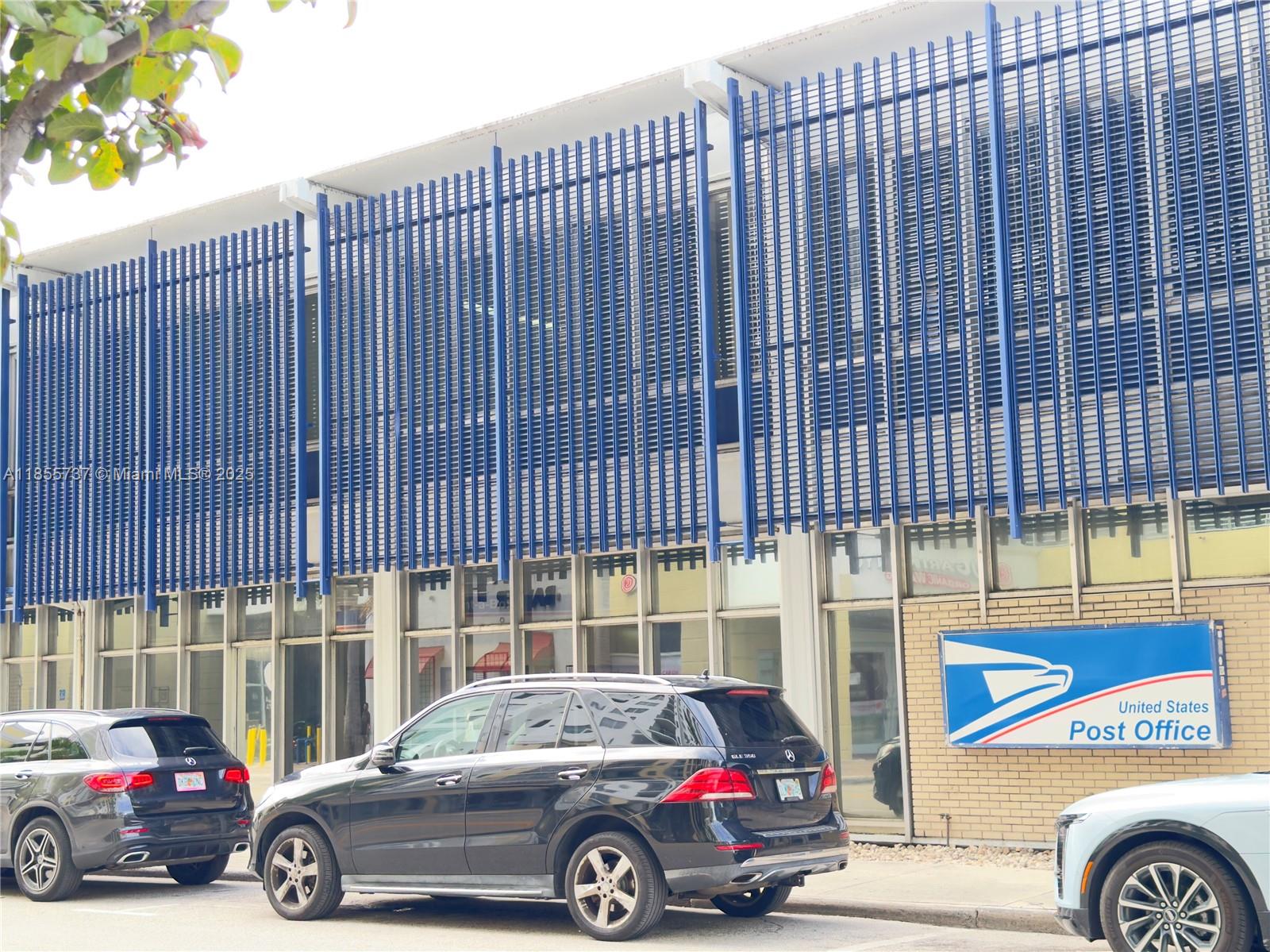 1830 Radius Drive, Unit 1301 Hollywood, FL 33020 - Photo 36 of 41 a car parked in front of a building