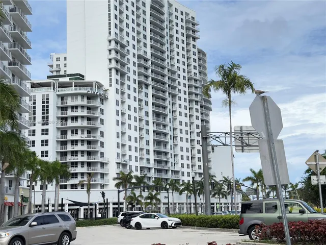a sign board with a palm trees