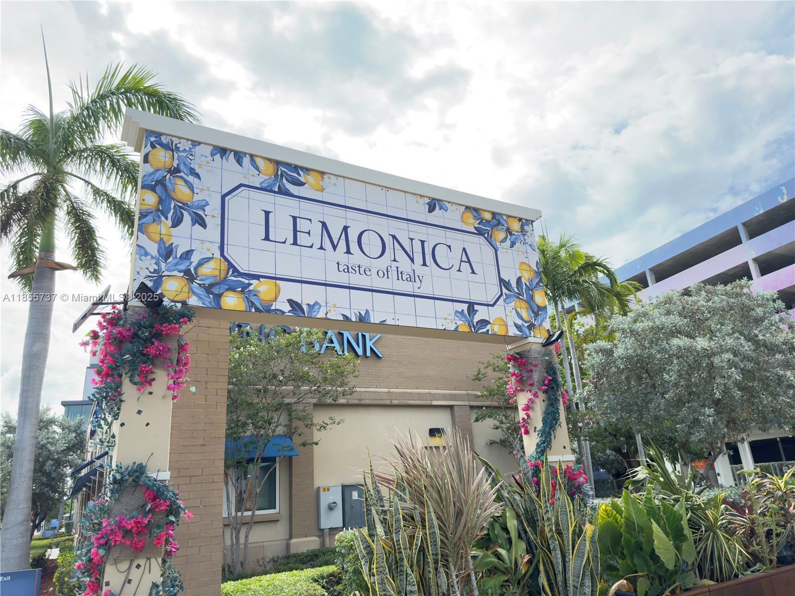 1830 Radius Drive, Unit 1301 Hollywood, FL 33020 - Photo 39 of 41 a sign that is on a pole