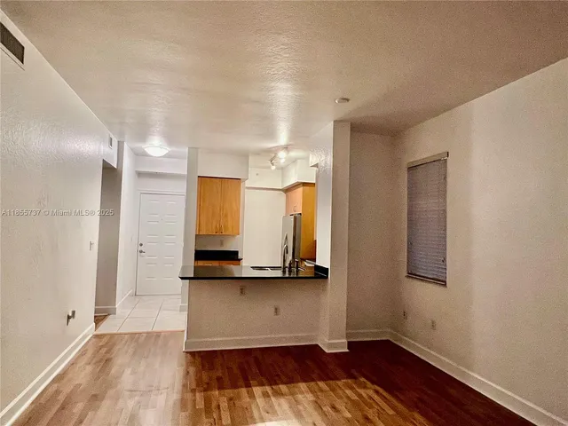 a view of a bathroom with sink and mirror