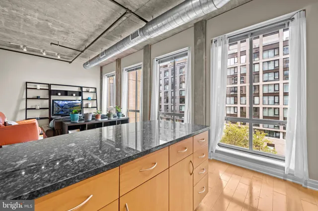 a view of a living room with furniture