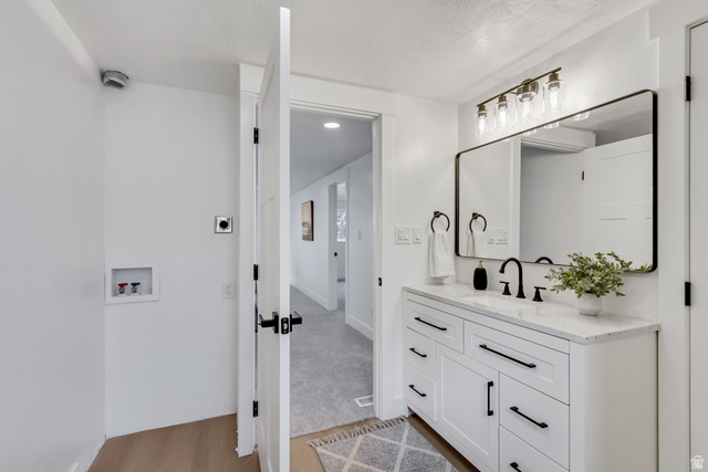 337 West 2900th Street South Bountiful, UT 84010 - Photo 27 of 35 Bathroom featuring vanity and light wood-type flooring