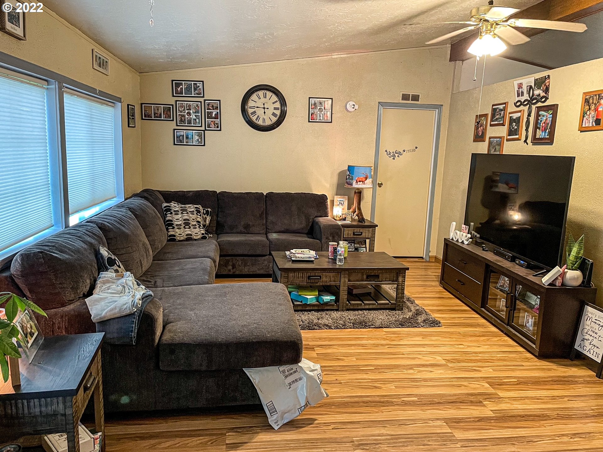 223 Neet Lane Riddle, OR 97469 - Photo 7 of 32 a living room with furniture and a flat screen tv