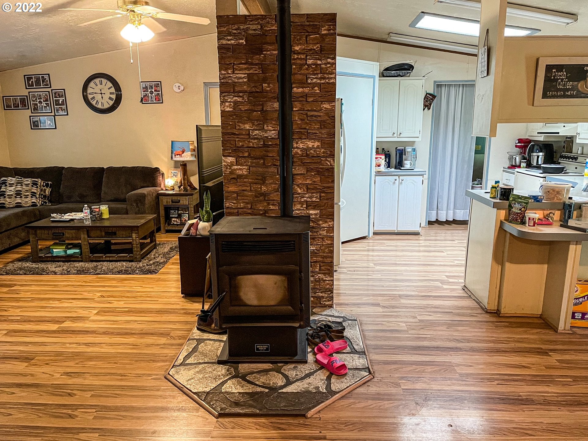223 Neet Lane Riddle, OR 97469 - Photo 8 of 32 a living room with furniture and a wooden floor