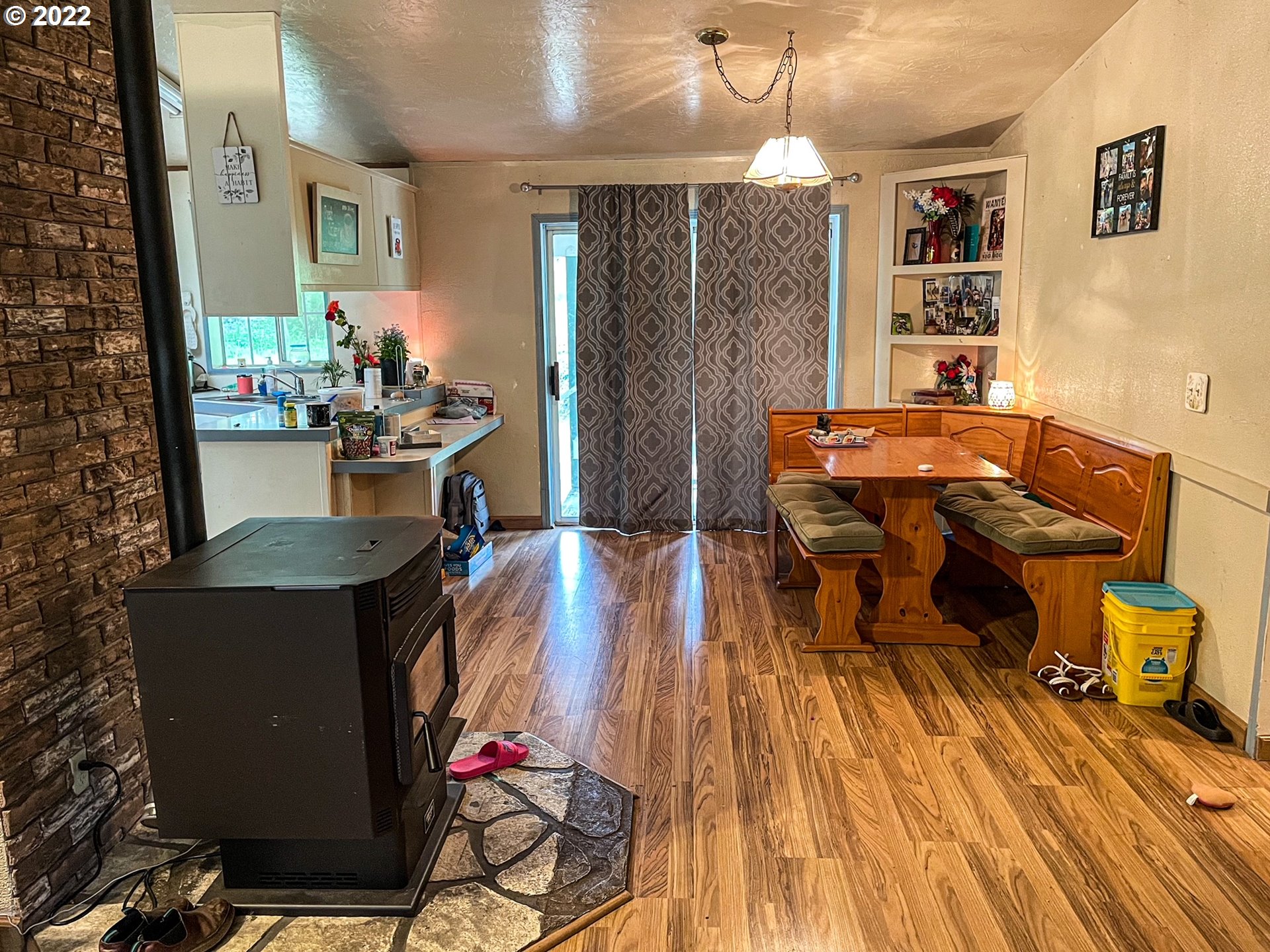 223 Neet Lane Riddle, OR 97469 - Photo 9 of 32 a living room with furniture and a wooden floor