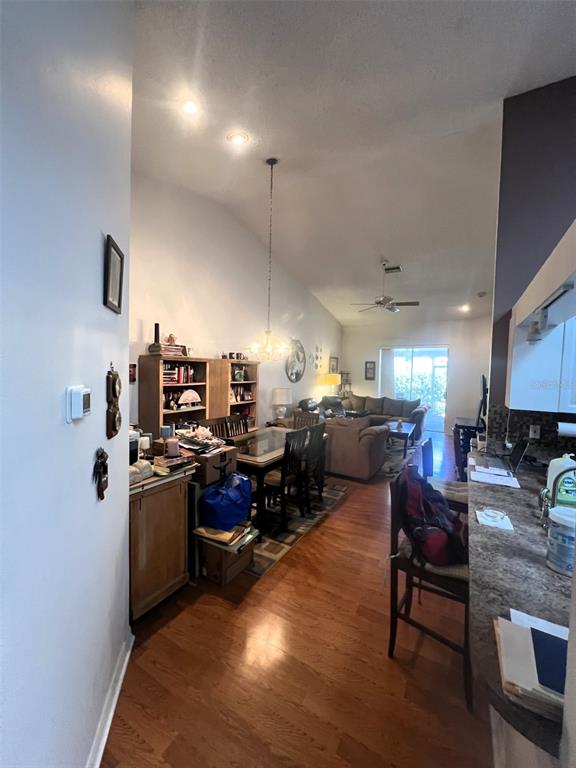 4207 Chesterfield Circle Palm Harbor, FL 34683 - Photo 3 of 7 a living room with lots of furniture and appliances