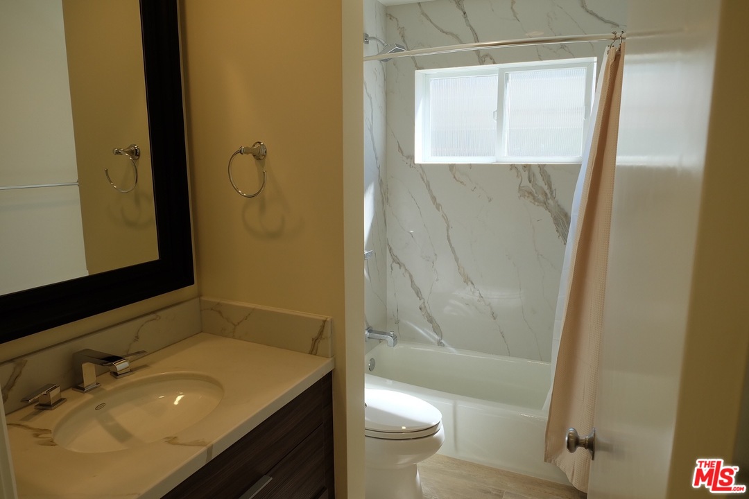 2 Catamaran Street, Unit 2 Marina del Rey, CA 90292 - Photo 15 of 17 a bathroom with a sink a toilet and shower