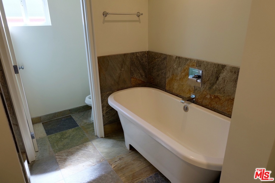 2 Catamaran Street, Unit 2 Marina del Rey, CA 90292 - Photo 8 of 17 a bathroom with a tub and sink