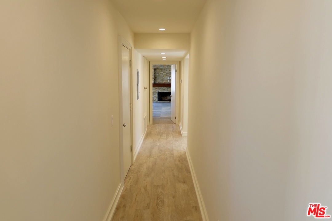 2 Catamaran Street, Unit 2 Marina del Rey, CA 90292 - Photo 10 of 17 a view of a hallway with wooden floor