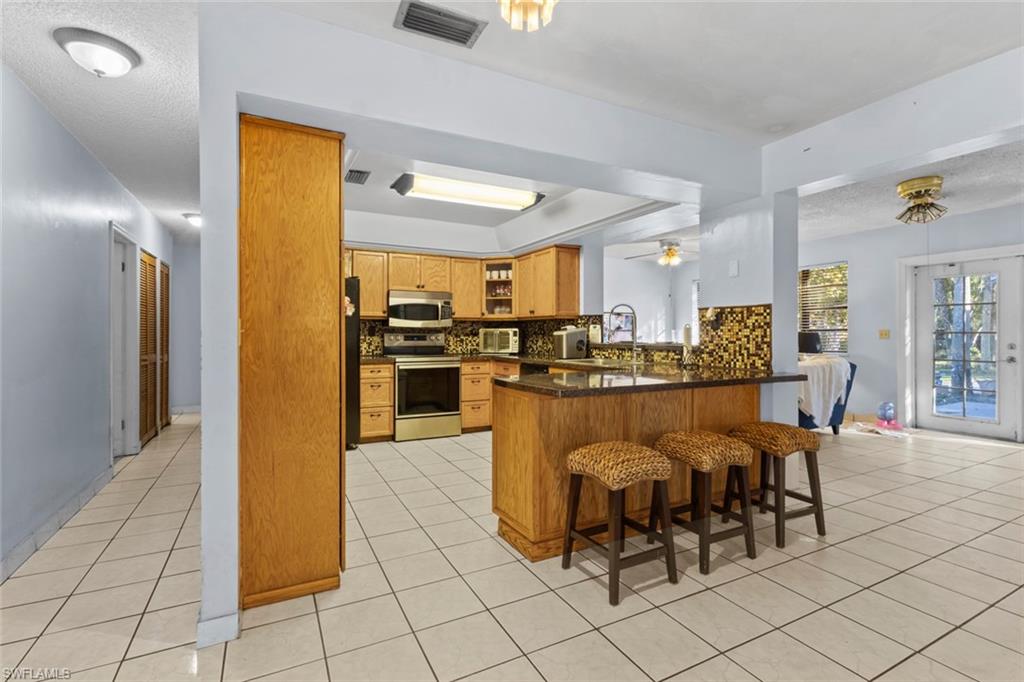 3680 7th Avenue Southwest Naples, FL 34117 - Photo 11 of 38