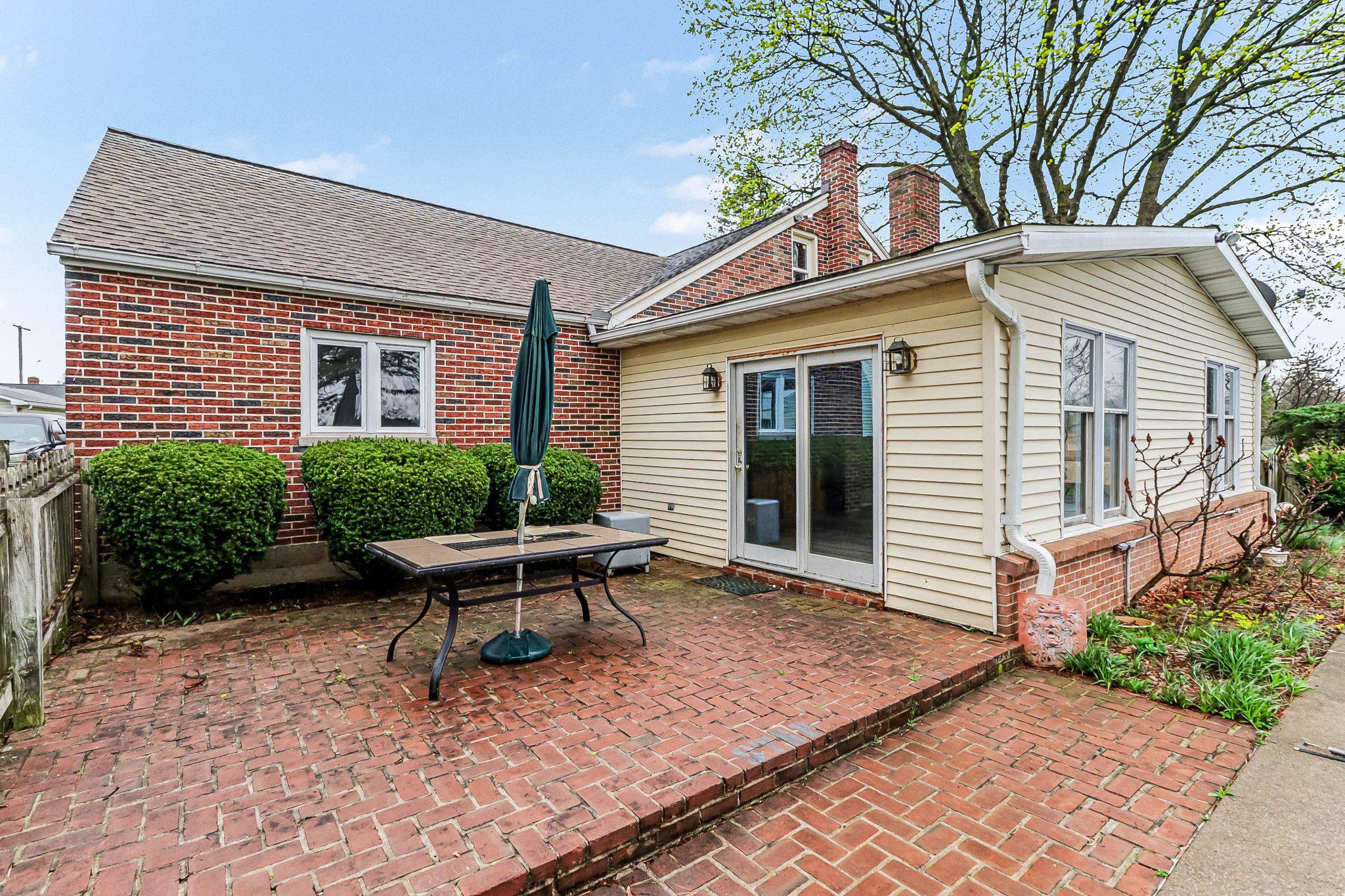 201 4th Street Boiling Springs, PA 17007 - Photo 26 of 34 a white bench sitting in front of a house