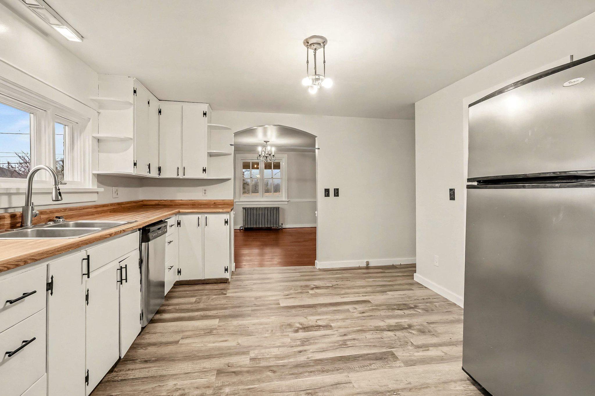201 4th Street Boiling Springs, PA 17007 - Photo 4 of 34 a large kitchen with cabinets and stainless steel appliances