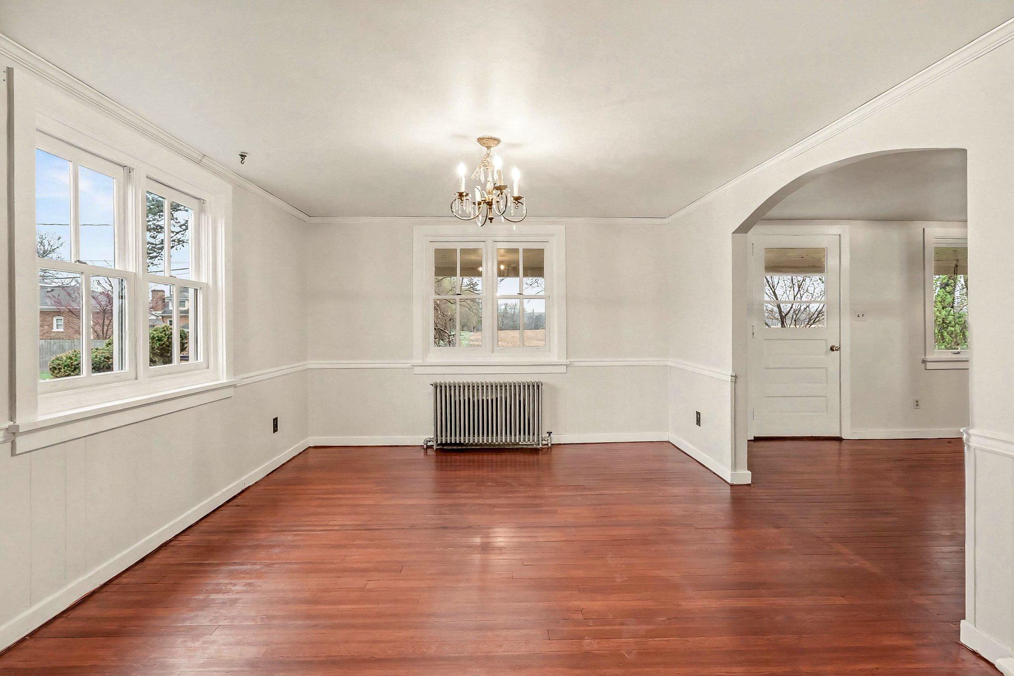 201 4th Street Boiling Springs, PA 17007 - Photo 6 of 34 wooden floor in an empty room with a window