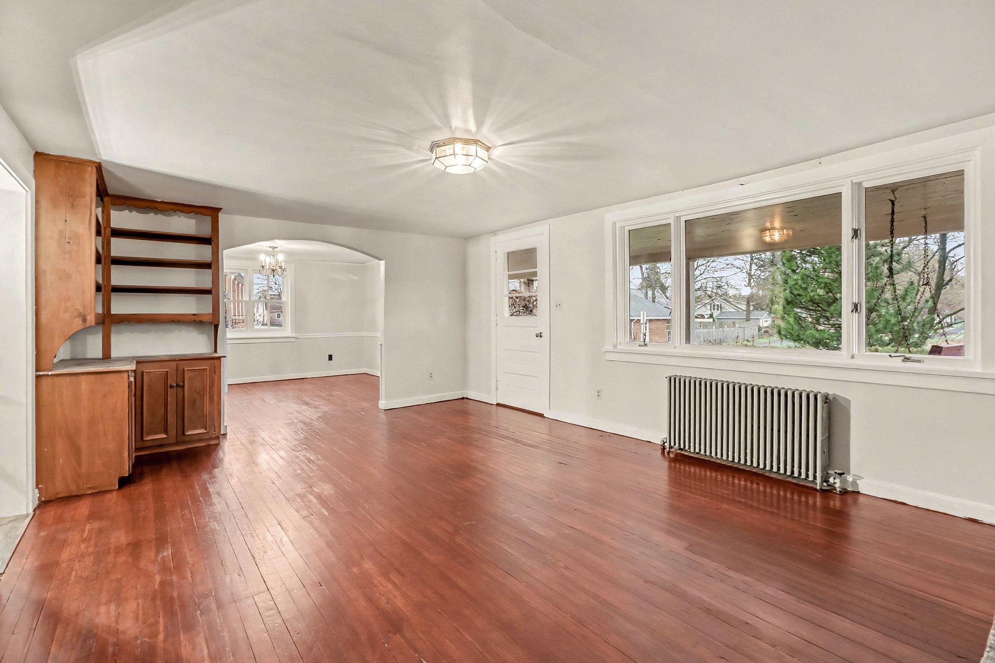 201 4th Street Boiling Springs, PA 17007 - Photo 7 of 34 a view of empty room with wooden floor and fan