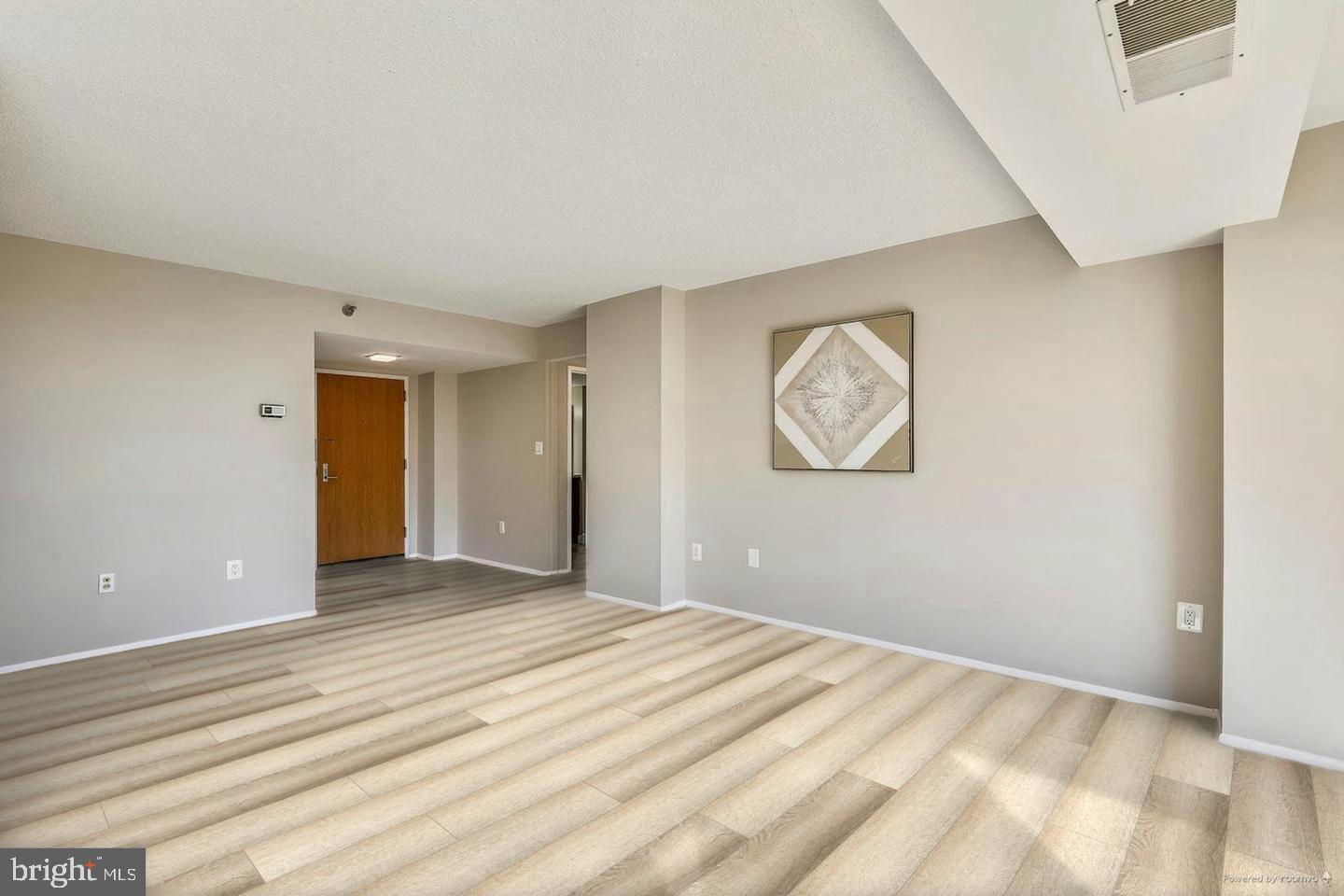 1808 Old Meadow Road, Unit 910 McLean, VA 22102 - Photo 7 of 28 Large open living room