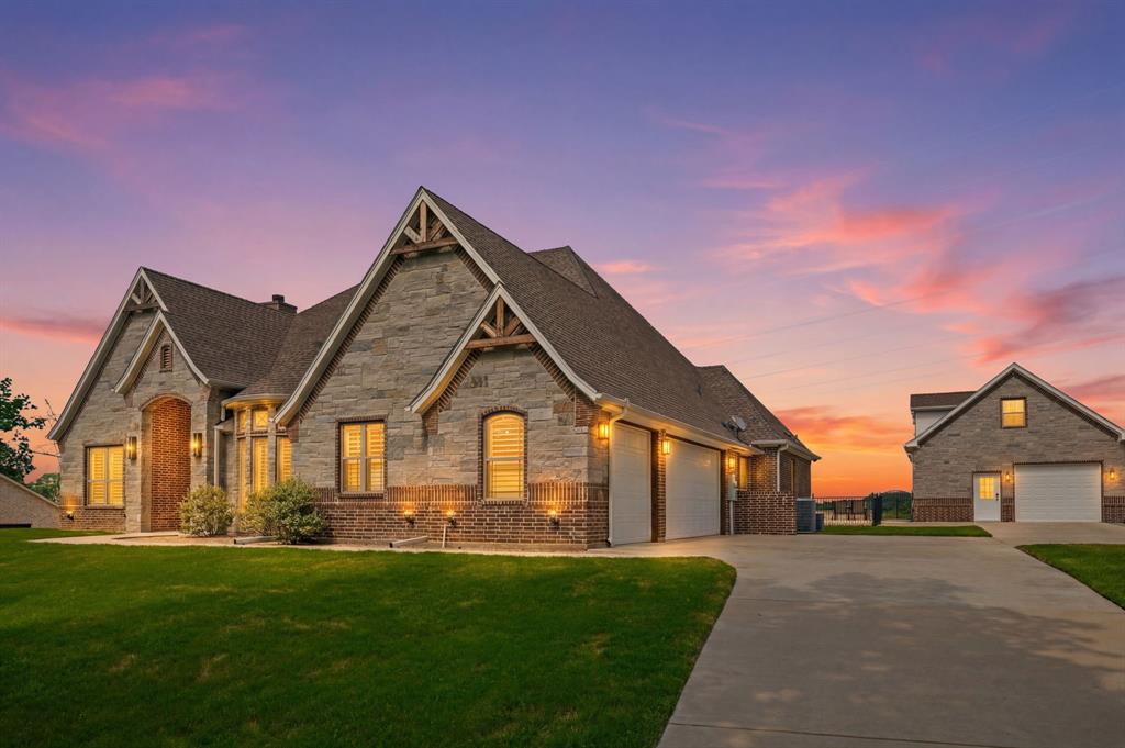 Front of home at twilight.