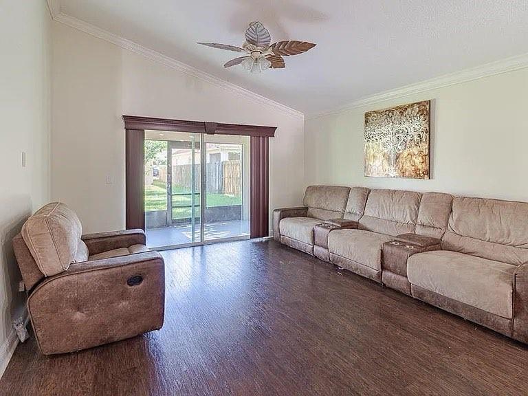 9446 Windrift Circle Fort Pierce, FL 34945 - Photo 7 of 13 a living room with furniture and a window