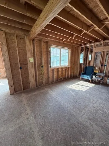 a view of empty room with windows